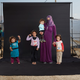 Image for article titled These striking family portraits show the lost members of Syrian refugee families